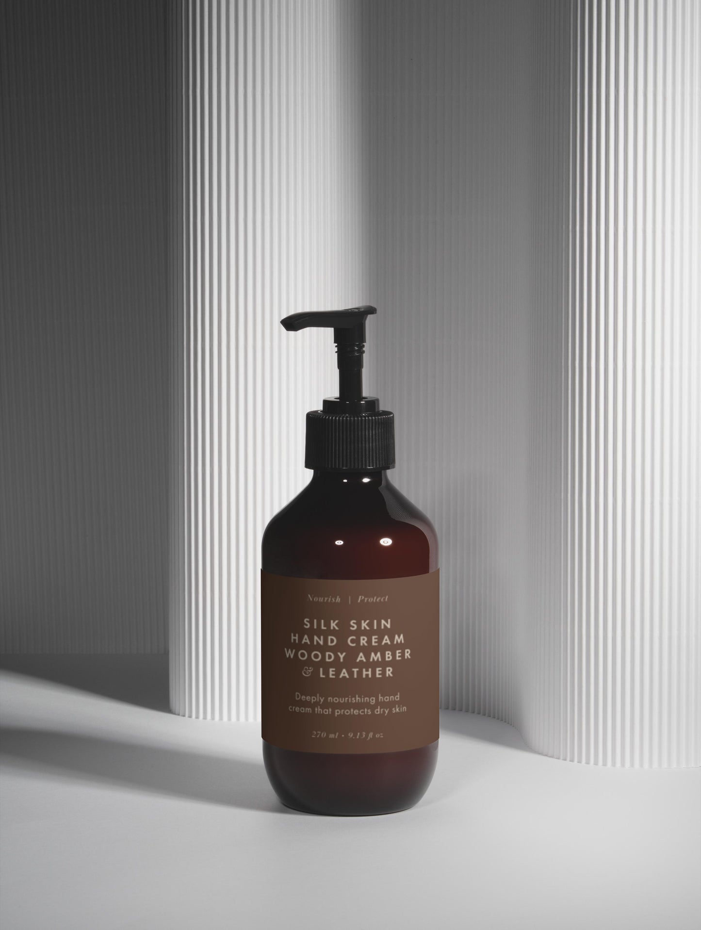 Silk Skin Hand Cream, Woody Amber & Leather